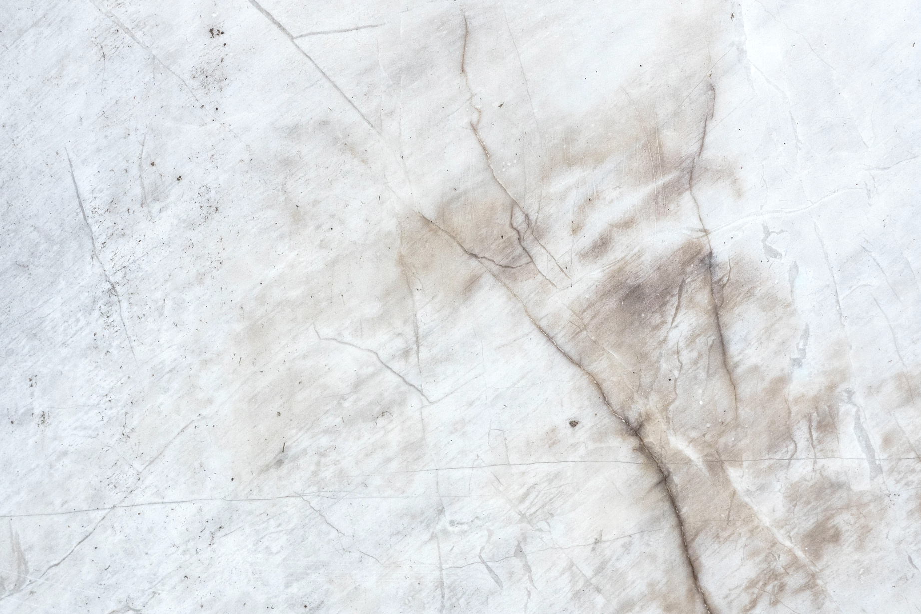 White marble surface with chaotic lines